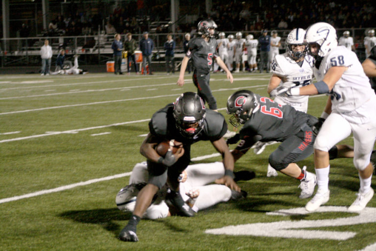 Sophomore running back Jacques Badalto-Birdsell breaks a tackle on his way to one of two touchdowns against Skyview at Doc Harris Stadium.