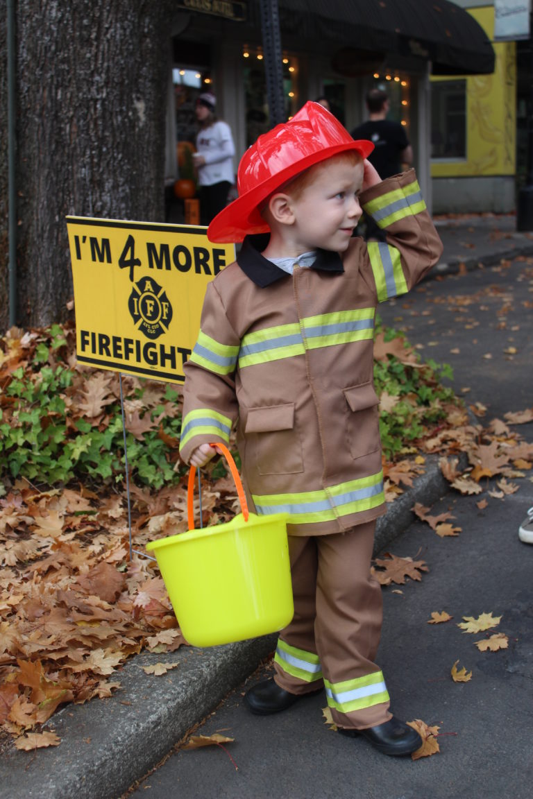 Jaxson Carr, 3, of Camas, dressed as a firefighter for the 2018 Boo Bash candy giveaway in downtown Camas, on Wednesday, Oct. 24.