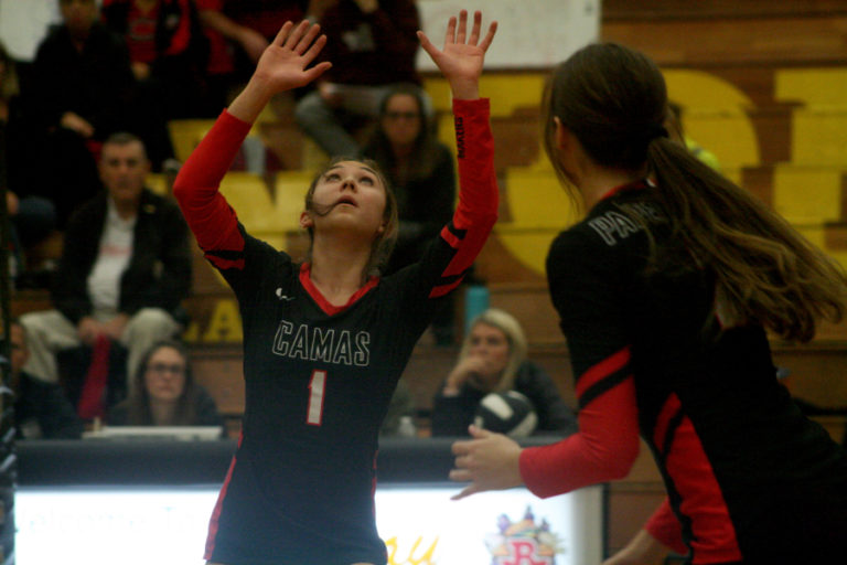 Camas junior Emma Villaluz sets up her teammates in a bi-district seeding match against Skyview.