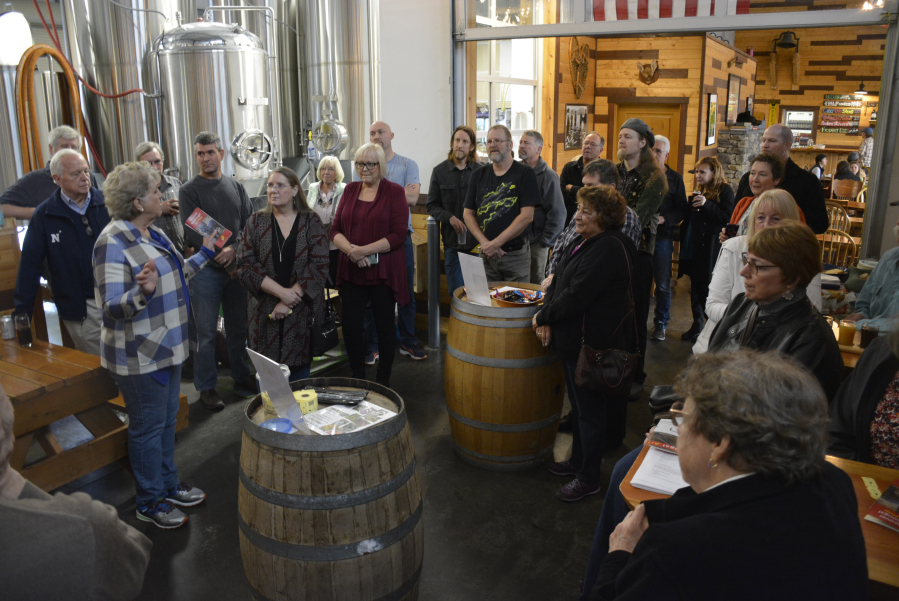 Washougal Mayor Molly Coston (left) talks to nearly 40 public art enthusiasts during a Washougal Arts and Culture Alliance (WACA) "Celebration of the Arts" reception, Nov. 3, at 54?40' Brewing Co., in Washougal. WACA, established in 2014, supports the work of regional artists.