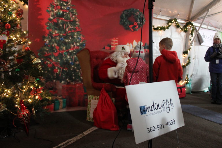 Windows of Life Photography provides free photos with Santa during the annual Hometown Holidays celebration in downtown Camas on Friday, Dec. 7.