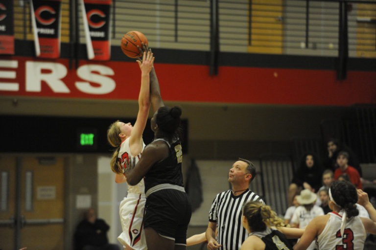 Faith Bergstrom (left) and Aaronette Vonleh (right) rise up for the overtime tip.  Both starting centers are only sophomores.