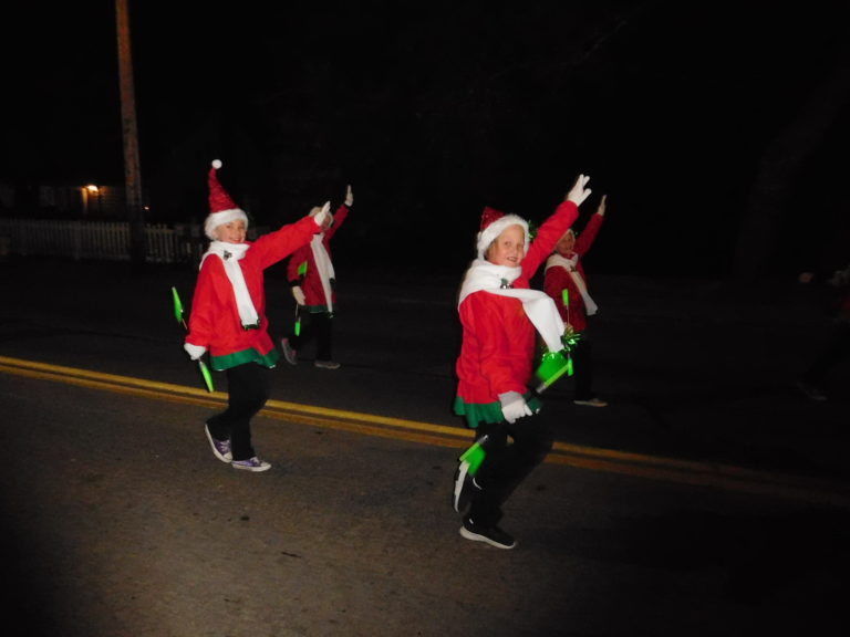 (Dawn Feldhaus/Post-Record) The Mt. Pleasant School “Fantastix Baton Club” entertains the crowd in the annual Lighted Christmas Parade, presented by the City of Washougal and the Downtown Washougal Association, Dec. 6.