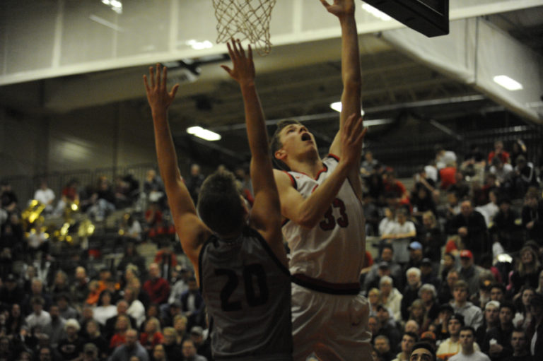 Camas basketball forward Jackson Clemmer makes a layup in front of a packed home crowd against Union High School, the No. 1 ranked 4A team in the state, on Jan.