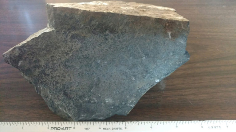 Camas-Washougal Fire Marshal Ron Schumacher measured a 6- to 8-inch rock that was blasted from a Lookout Ridge area blasting site and fell through a townhouse roof. The Fire Marshal's Office suspended North Idaho Drilling Inc.'s blasting permit after the 12- to 15 pound rock landed in a child's bedroom. There were no injuries.