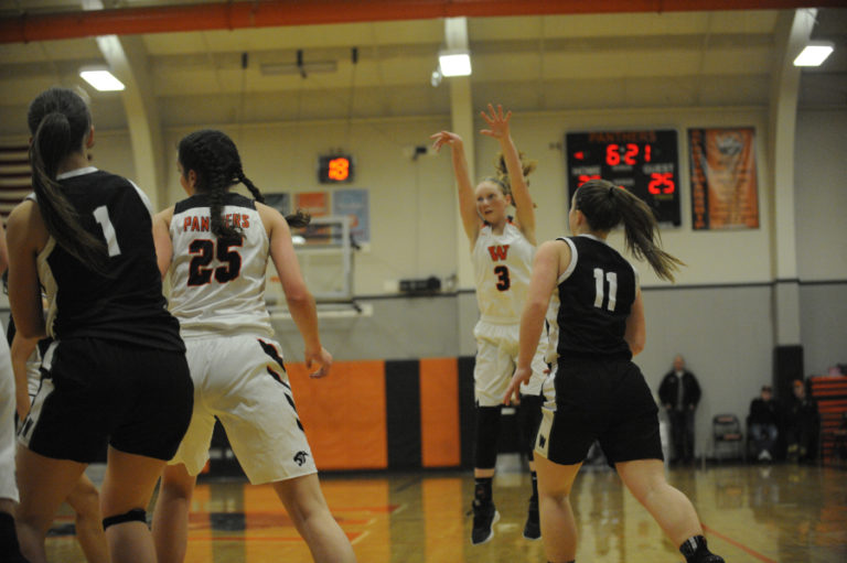 Panther freshman Savea Mansfield hits a three point shot following an assist from Skylar Bea in the paint.