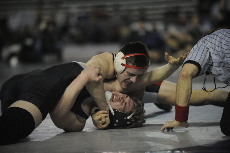 Camas senior Gideon Malychewski powers through the Mat Classic at the Tacoma Dome and is now the 170 pound state champion.