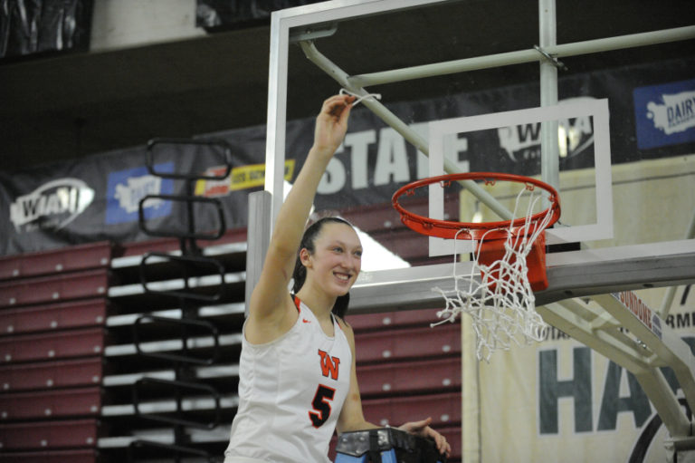 Beyonce Bea takes a souvenir from Washougal&#039;s historic state championship victory at the Yakima Valley SunDome on Saturday, March 2.
