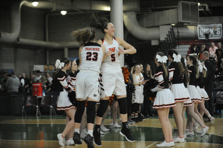 Beyonce and her teammates having fun as the starting lineups were announced for the state championship game in the Yakima Sundome on Saturday, March 2.