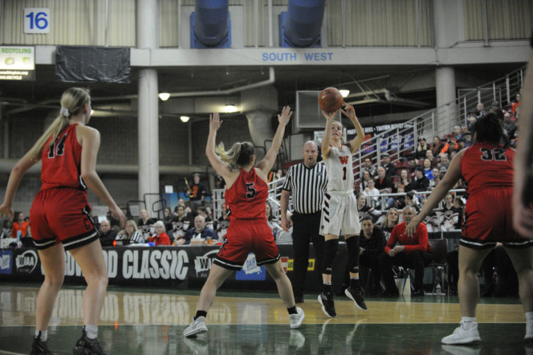 Jaiden Bea lets it fly from long range against Clarkston.  The freshman led all scorers in the opening game against WF West with 18 pts.