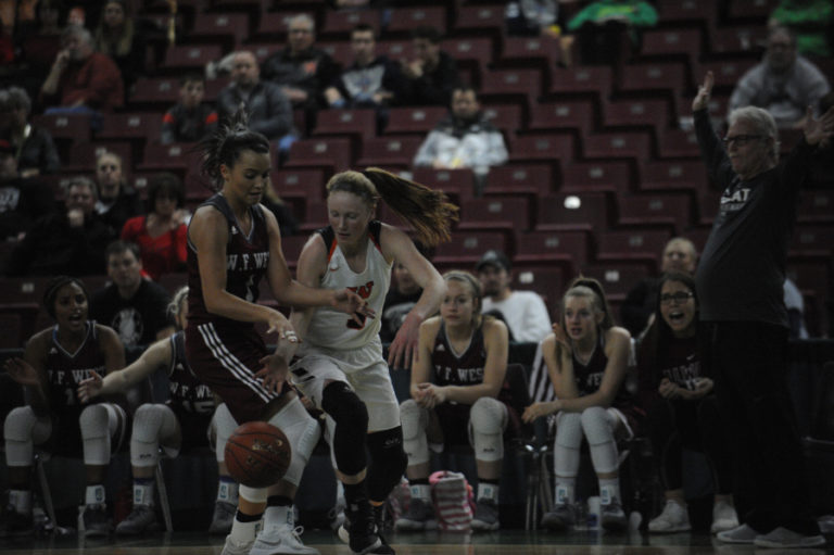 Freshman Savea Mansfield makes a steal against W.F. West in the Panther's opening state tournament game on Feb. 28. in Yakima.