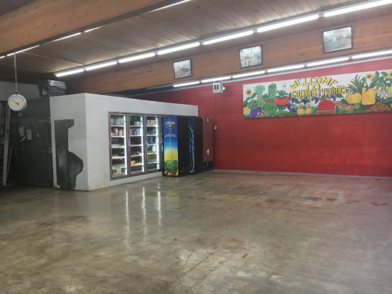 A January vehicle crash pushed tables into the refrigeration units inside Camas Produce. Forced to close until insurance money could fund repairs, the market's owner has taken the time to repaint and improve the floors inside the shop.