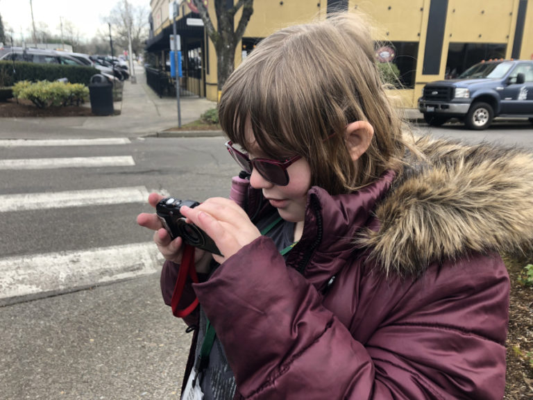 Sixth-grader Tori Eastman, 12, reviews photos she&#039;s taken during her photography class field trip to downtown Camas on Monday, March 11.