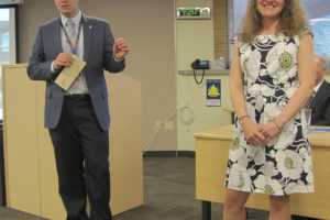 Camas School District superintendent Jeff Snell announces that Hellen Baller Elementary School teacher Amy Campbell (right) is the district's nominee for the 2020 Washington Teacher of the Year award at the district's board of directors meeting March 25. 