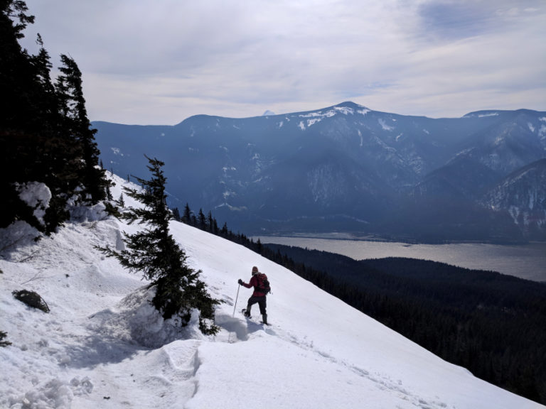Dave Deal snowshoes up a snow covered Dog Mountain which will soon be thrilling hikers in the Columbia River Gorge with spectacular wildflowers.