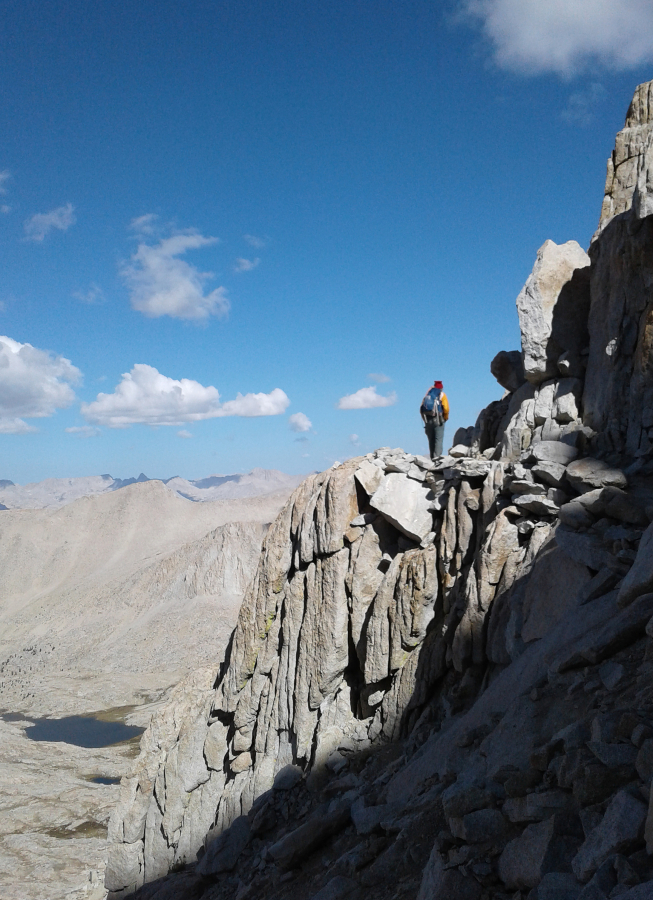 Boni Deal hiking the steep rocky trail to the top of Mount Whitney, the highest point in the lower 48 states.
