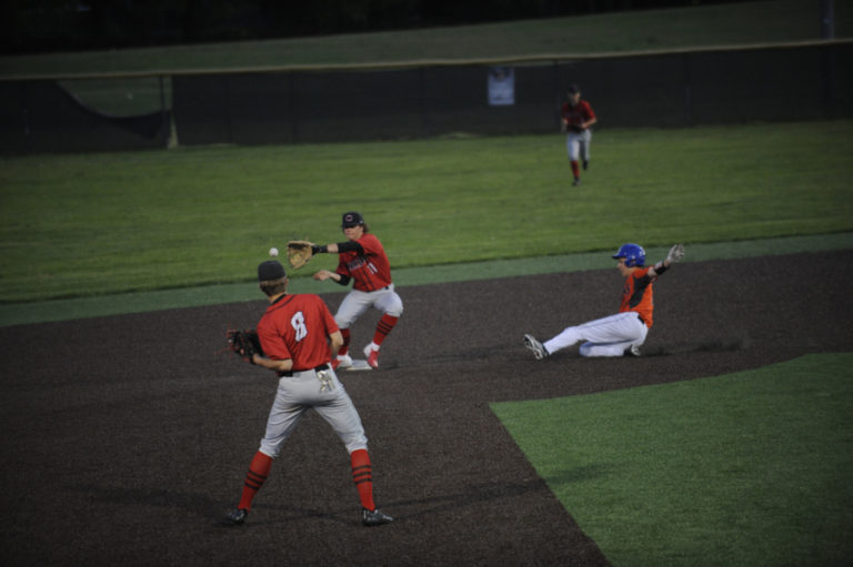 Third baseman Shane Jameson attempts a double play to second baseman Michael Quintana against Auburn Mountainview at Propstra Stadium in Vancouver on May 7.