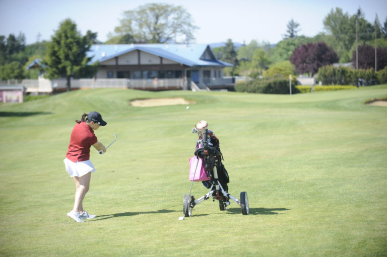 Emma Cox hits a laser shot at Tri-Mountain Golf Course in Ridgefield on her way to a 4a district title.