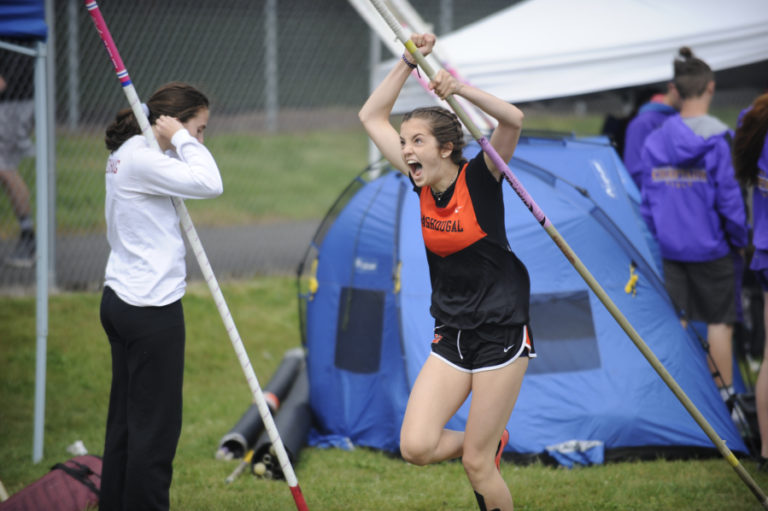 Washougal pole vaulter Kylianna Momakov celebrates after clearing 9 feet on Saturday.