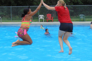 Youth in foster care can enjoy summer camp activities such as swimming, thanks to a nonprofit, faith-based group called Teen Reach Adventure Camp. Portland pianist Michael Allen Harrison will perform Thursday, June 20 in Vancouver at a concert to benefit the newly formed Camas chapter of TRAC. (Contributed photo courtesy of Teen Reach Adventure Camp)