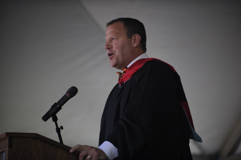 Washougal High School principal Aaron Hansen, who was recently promoted to assistant superintendent for the Washougal School District, speaks at his last graduation ceremony as principal on June 8.