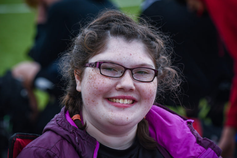 Kaitlynn McKee smiles after winning the district unified soccer championship.