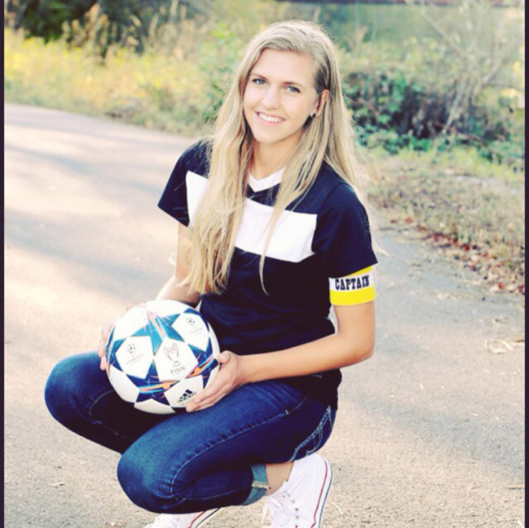 Contributed photo courtesy of Mo Speer 
 Ellie Schmid dribbles the ball while playing for Luther College in Decorah, Iowa, in 2017.