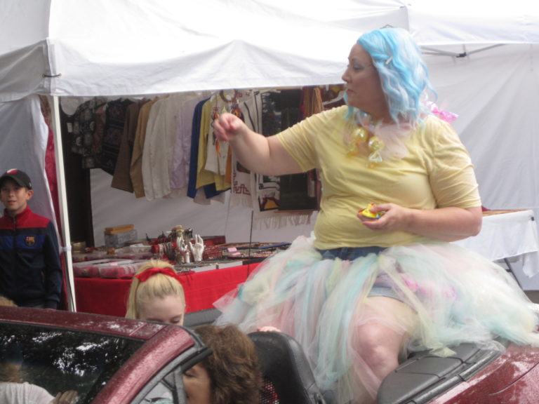 Camas mayor Shannon Turk throws candy during the Camas Days Grand Parade on Saturday, July 27.