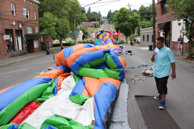 A bounce house is inflated for Camas Days on Saturday, July 27.