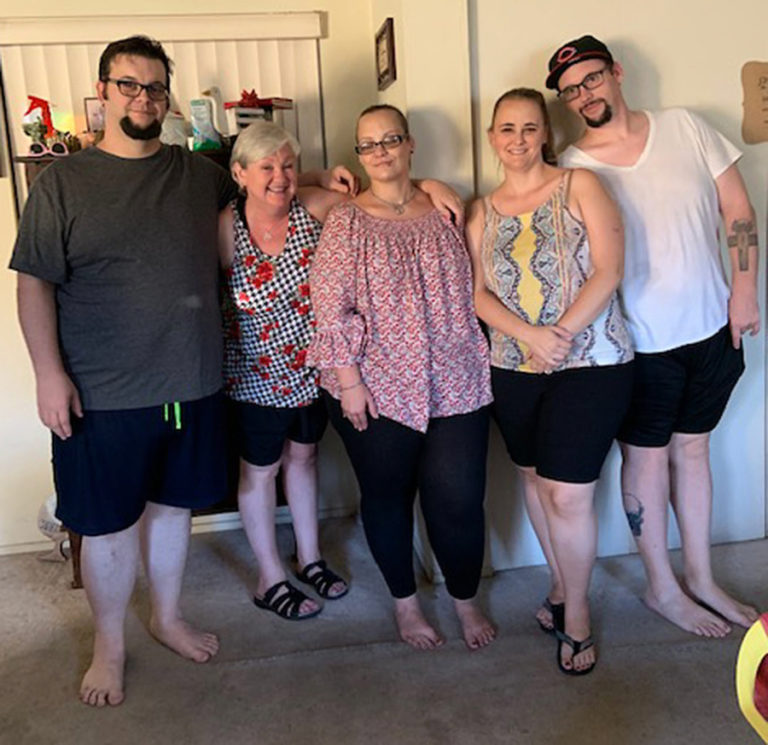 Washougal resident Melanie Ausmus (second from left) stands with her four step-siblings after meeting them for the first time earlier this month in Claremont, Calif.
