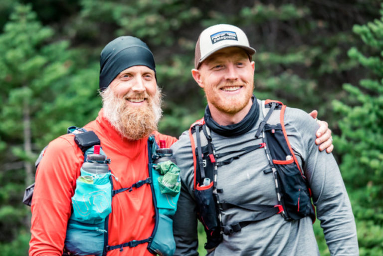 Dave Stinchfield (left) poses with his brother Tom at mile 140 of the Bigfoot 200 ultramarathon earlier this month.  Tom paced Dave for almost 30 miles on the race's third day.