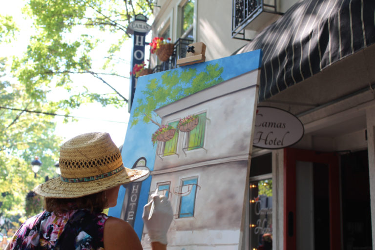 Liz Pike paints the Camas Hotel during the 2018 Plein Air event in downtown Camas. This year's painting event will fill the streets of downtown Camas with artists and artwork on Friday, Sept. 6.
