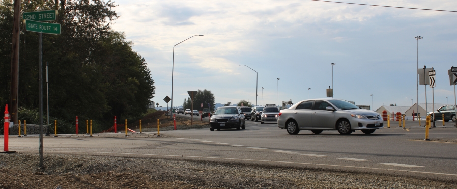 Travelers drive through a temporary roundabout on Highway 14 and 32nd Street on Aug. 29. A Washington State Department of Transportation (WSDOT) project to construct two permanent highway roundabouts in Washougal is on track to be completed by January, WSDOT officials say. (Photos by Doug Flanagan/Post-Record)