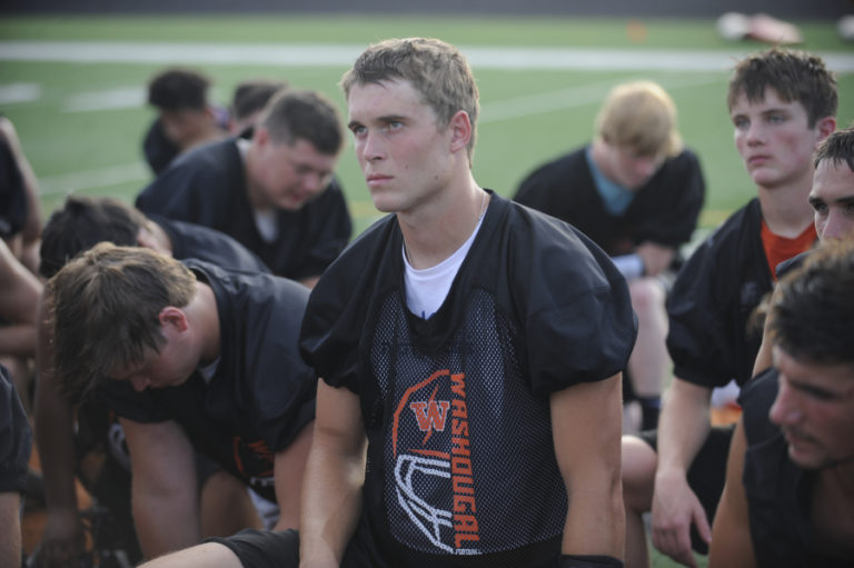 Wayne Havrelly/Post-Record
Washgougal High School football players push through an intense practice session in 95-degree temperatures last month.