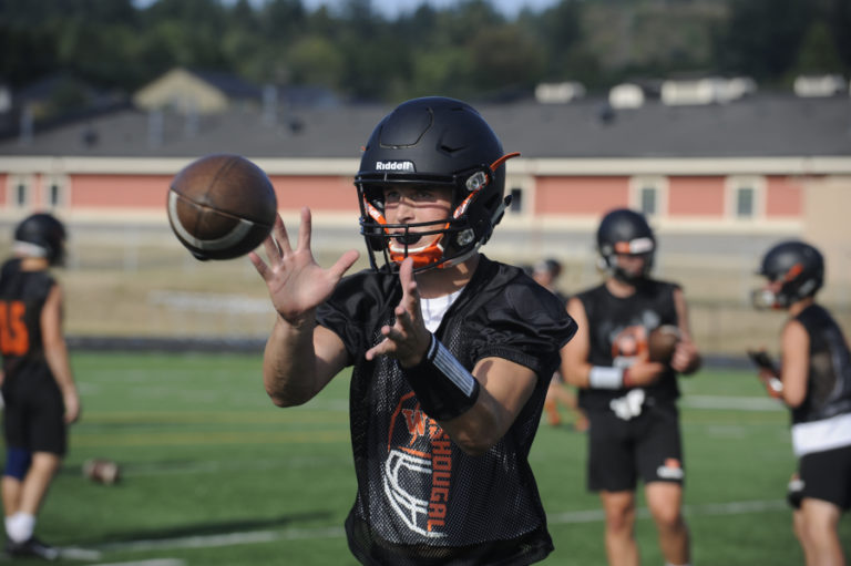 Wayne Havrelly/Post-Record
Washougal High School wide reciever Jakob Davis takes off his knee brace during a recent practice session. Davis suffered a torn ligament in his knee last season and was cleared to play just a week before the Panthers&#039; first practice. He says his knee feels strong after nearly a year of rehabilitation.