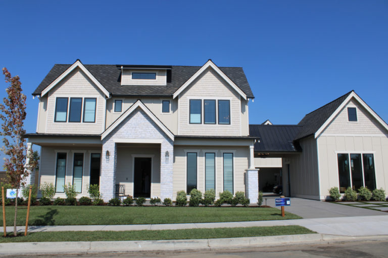 &quot;The Hamlin,&quot; by Affinity Homes, is a 4,486-square-foot, four-bedroom home that features reclaimed brick, 20-foot ceilings in the great room, a custom-built indoor dog kennel, a media room with an 82-inch television and Dolby Atmos theater system and blackout shades controlled by the owners&#039; smartphones.