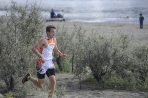 Washougal High School senior runner Caden Lowman runs at Captain William Clark Park during the Panthers' first home meet of the season Sept. 18. (Wayne Havrelly/Post-Record)
