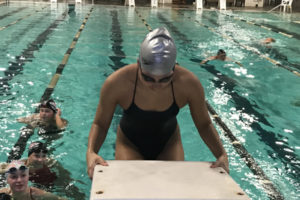Camas High School senior swimmer Bailey Segall practices the backstroke during a practice session at Cascade Athletic Club in Vancouver. (Wayne Havrelly/Post Record)