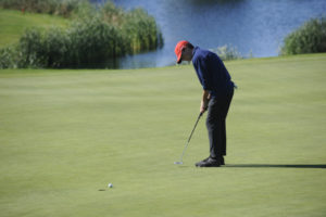 Camas High School golfer Owen Huntington drains a 10-foot putt at Tri-Mountain Golf Course in Ridgefield on Oct. 10. (Wayne Havrelly/Post-Record)