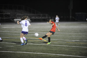 Camas High School sophomore forward Kiya Gramps scores a goal against Heritage High School on Oct. 17 at Doc Harris Stadium in Camas. (Wayne Havrelly/Post-Record)