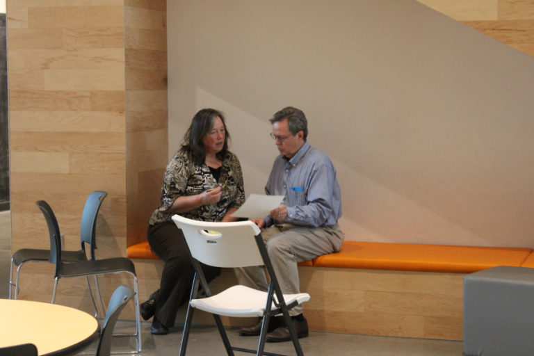 Write-in Camas City Council candidate Margaret Tweet (left) prepares for her remarks at the Youth Advisory Council&#039;s Oct.