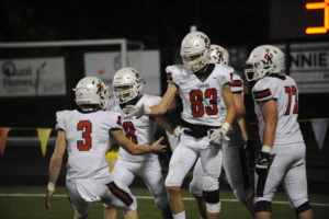 Camas High School senior wide reciever Jackson Clemmer (23) and junior quarterback Jake Blair celebrate after a touchdown against Skyview High School on Oct. 24 at Kiggins Bowl. Blair later left the game after suffering a broken collarbone as the result of being tackled. (Photos by Wayne Havrelly/Post-Record)