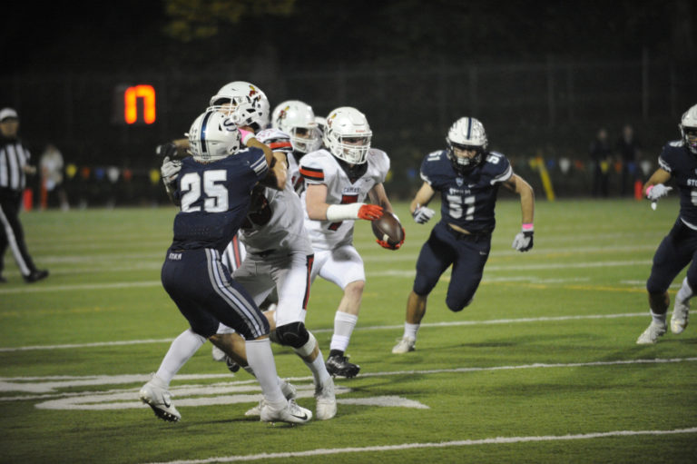 Camas High School senior quarterback Blake Ascuitto fires a pass during a late-game drive against Skyview High School on Oct. 24.