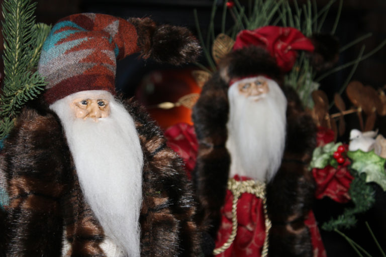 Sandy Havrelly, of Washougal, shows the sunny space in her kitchen where she crafts her Santa figurines. Dressed in fabric that often includes Pendleton wool and fur (pictured) with realistic, hand-sculpted faces, &quot;Sandy&#039;s Santas&quot; are a big hit at the annual Washougal United Methodist Church Holiday Bazaar. The Santas, priced between $100 and $150, typically sell out on the first night of the two-day bazaar, set for this Friday and Saturday, Nov. 8-9.
