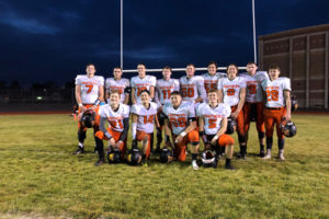 Washougal High School seniors celebrate after the Panthers' historic come-from-behind victory in the first round of the 2A state tournament on Nov. 16. (Wayne Havrelly/Post-Record)