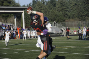 Senior Jackson Clemmer makes a difficult catch in the end zone for his second touchdown of the day.  Clemmer caught all six passes thrown his way for 153 yards.