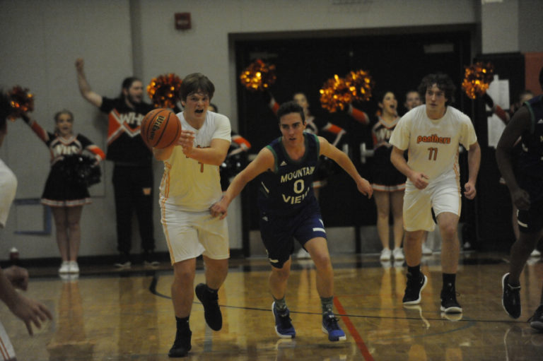 Washougal High School freshman Yanni Fassalis makes a move past a Mountain View High School defender at Washougal High School on Dec.