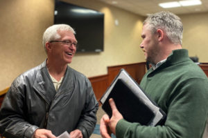 Camas Mayor Barry McDonnell (right) greets Camas resident John Ley after the Dec. 2 Camas City Council meeting. The Dec. 2 meeting was McDonnell's first official city council meeting as Camas' new mayor.  McDonnell won his last-minute write-in bid against former Mayor Shannon Turk in the Nov. 5 general election. (Photos by Kelly Moyer/Post-Record)
