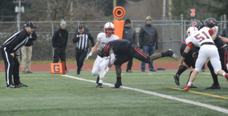 Camas High School junior Jacques Badolato-Birdsell follows his blockers for his third touchdown against Mount Si High School on Nov. 30 at McKenzie Stadium in Vancouver.