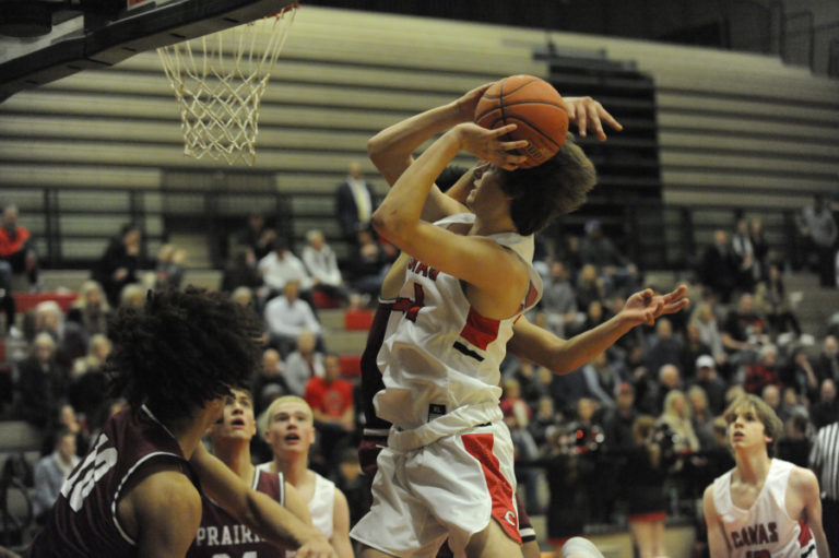 Camas High School junior Blake Bell drives to the basket against Prairie High School in the Papermakers' home opener on Dec. 5.